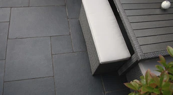 Charcoal patio paving pavers feature deep, elegant shades and a refined texture, perfect for enhancing outdoor spaces with a contemporary stone appeal