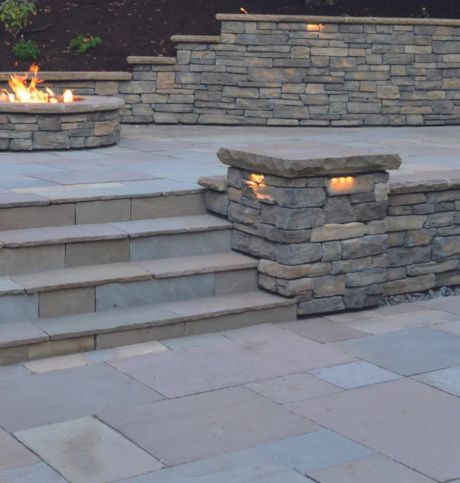 Upgrade your patio with gorgeous stone and pavers, creating a warm, inviting space where family and friends can gather and make memories.