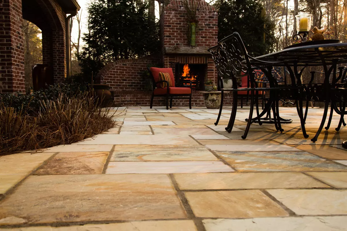 Golden Fossil patio paving pavers exhibit stunning golden shades and intricate fossil designs, enriching outdoor spaces with natural stone elegance.