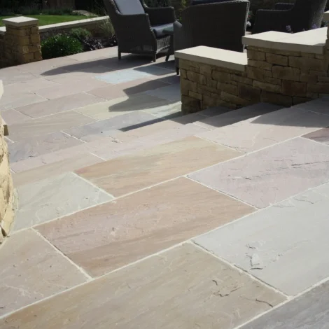 Lakeland Classicstone pavers in soft grays and earthy hues, perfect for designing charming and inviting outdoor patios.