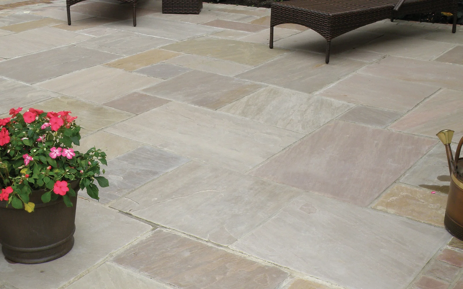 Natural stone pavers from Lakeland Classicstone feature soft grays and earthy tones, ideal for creating elegant patios and stunning pool decks.