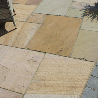 Harvest-colored pavers bring warmth and a natural touch to outdoor areas, enhancing beauty and durability.