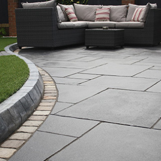 Transform your outdoor area with Charcoal Classicstone pavers, offering a sleek look and exceptional durability.