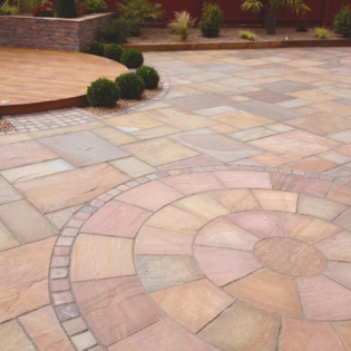 Transform your patio with beautiful stone pavers and a circle kit, creating a durable and inviting outdoor space for relaxation and gatherings.