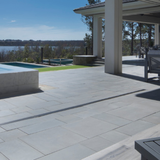 Enhance your patio with Platinum pavers, featuring elegant stone design for a sophisticated and durable paving solution.