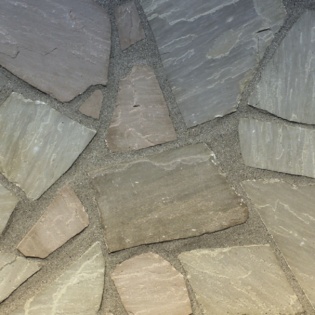 Autumn Veneer stone showcasing warm earthy tones for stunning outdoor landscaping projects.